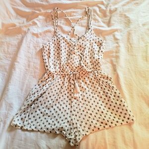 Pimkie Romper with pockets and tassel cinch waist.